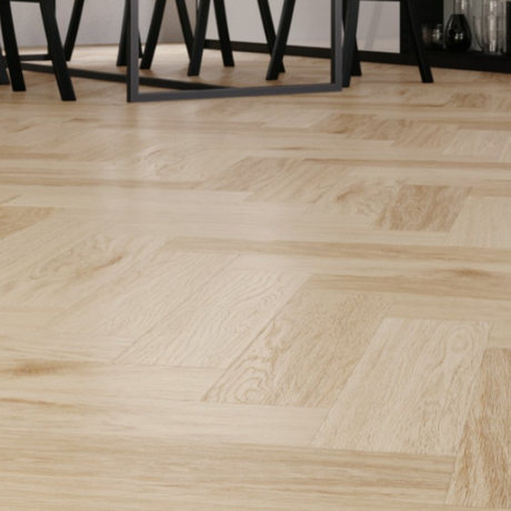 The Harlow Oak Herringbone SPC Flooring features a timeless oak design, suitable for underfloor heating, Titanium Nano finish and a 25 year warranty