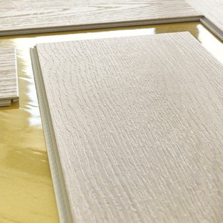 The Harlow Oak Herringbone SPC Flooring features a timeless oak design, suitable for underfloor heating, Titanium Nano finish and a 25 year warranty