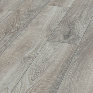 The Highland Oak Silver Laminate Flooring - 12mm features elegant long planks, AC5 durability and 5G click system installation.