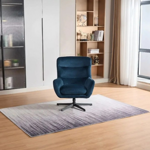 The Idris Swivel Chair & Footstool in Deep Ocean & Winter Moss features 360° rotation, plush comfort and sturdy metal base for stylish relaxation