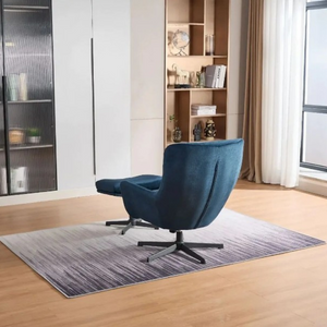 The Idris Swivel Chair & Footstool in Deep Ocean & Winter Moss features 360° rotation, plush comfort and sturdy metal base for stylish relaxation