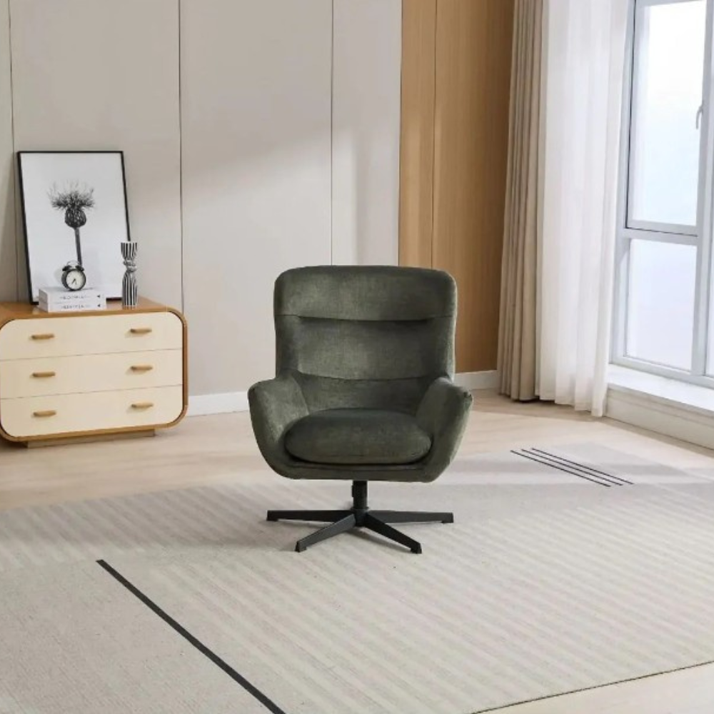 The Idris Swivel Chair & Footstool in Deep Ocean & Winter Moss features 360° rotation, plush comfort and sturdy metal base for stylish relaxation