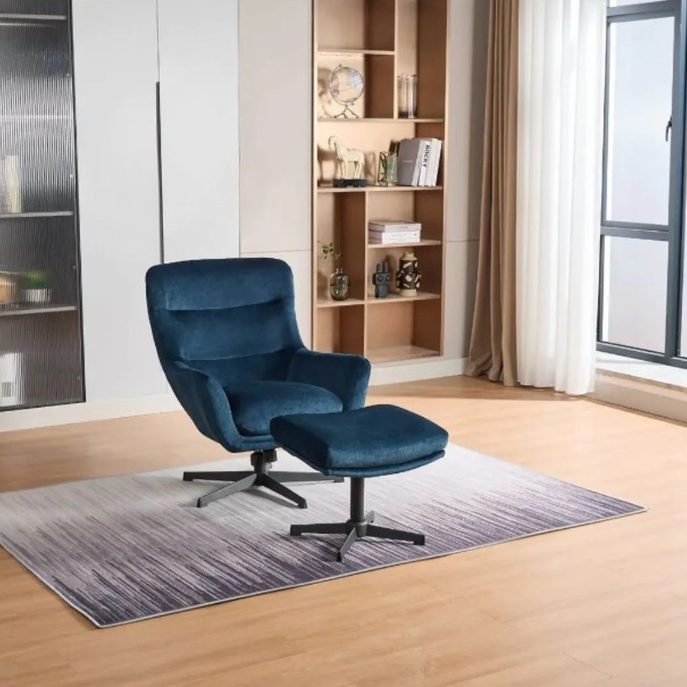 The Idris Swivel Chair & Footstool in Deep Ocean & Winter Moss features 360° rotation, plush comfort and sturdy metal base for stylish relaxation