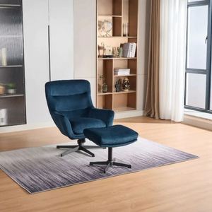The Idris Swivel Chair & Footstool in Deep Ocean & Winter Moss features 360° rotation, plush comfort and sturdy metal base for stylish relaxation