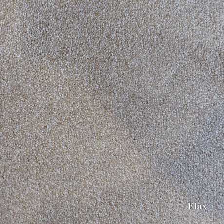Close-up of a textured beige surface with 'Flax' branding.