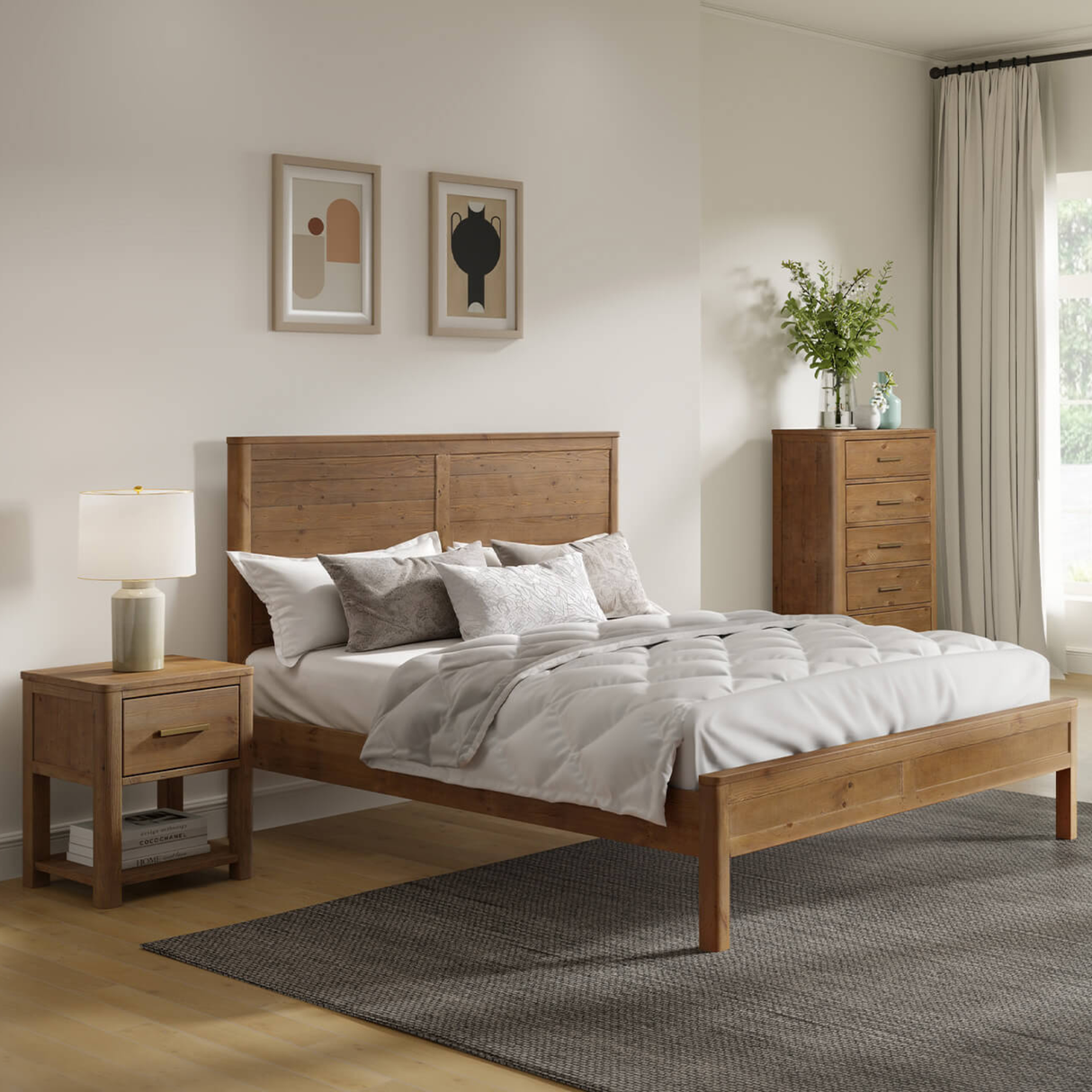Wooden bed with white bedding in a bedroom setting with nightstands and artwork.