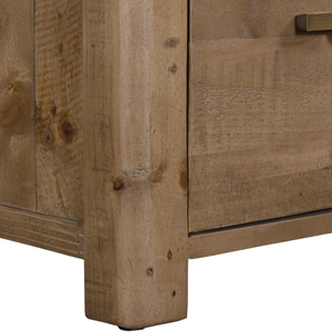Close-up of a wooden cabinet with a focus on the corner and handle.