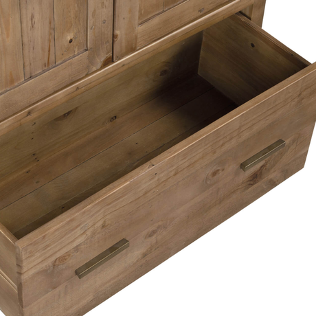 Wooden drawer with brass handles on a white background