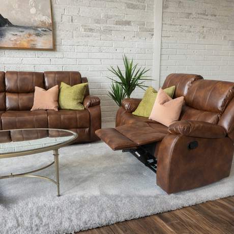Add some style with the Jasper Recliner Sofa in Tan featuring plush cushioning, smooth recline and timeless design make it perfect for any living space