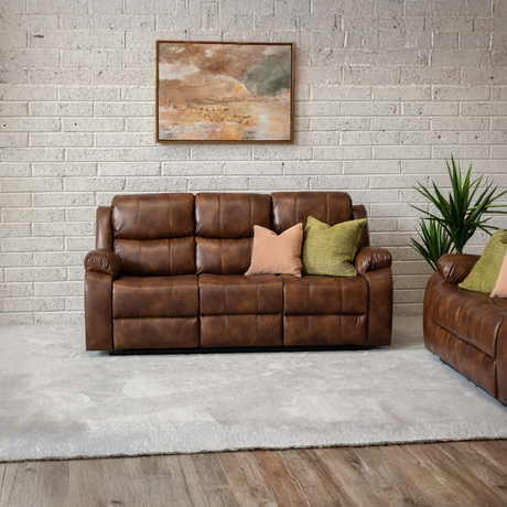 Add some style with the Jasper Recliner Sofa in Tan featuring plush cushioning, smooth recline and timeless design make it perfect for any living space
