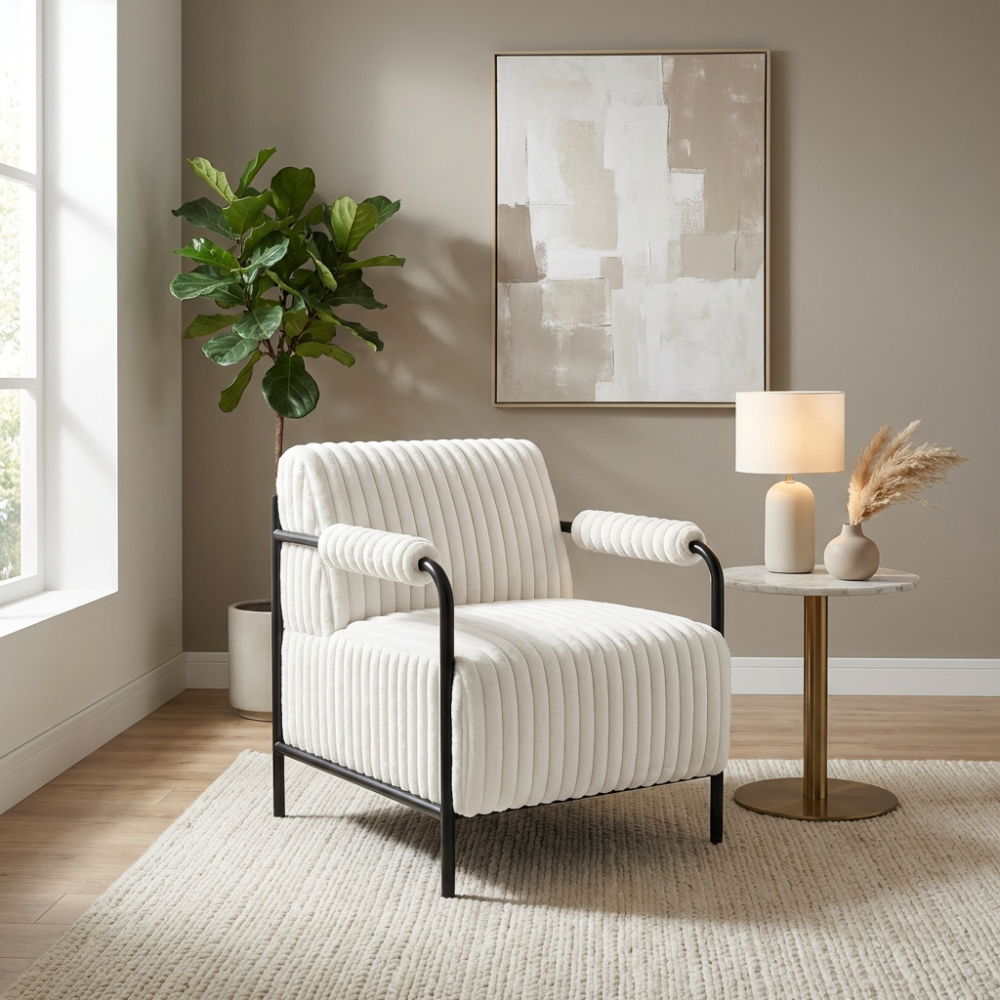 The Jolie Velvet Accent Chair in Green & White features soft velvet, padded armrests and a strong metal frame for a modern, comfortable statement piece