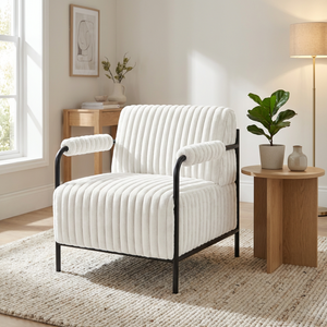 The Jolie Velvet Accent Chair in Green & White features soft velvet, padded armrests and a strong metal frame for a modern, comfortable statement piece