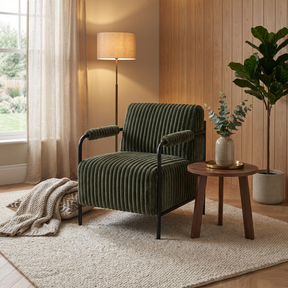 The Jolie Velvet Accent Chair in Green & White features soft velvet, padded armrests and a strong metal frame for a modern, comfortable statement piece