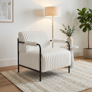 The Jolie Velvet Accent Chair in Green & White features soft velvet, padded armrests and a strong metal frame for a modern, comfortable statement piece