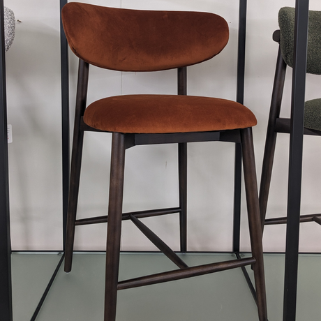 The Jude Barstools in Moss Green and Grey Boucle and Rusty Orange Velvet with wooden frame and legs for a modern design, comfort and timeless style