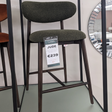 The Jude Barstools in Moss Green and Grey Boucle and Rusty Orange Velvet with wooden frame and legs for a modern design, comfort and timeless style
