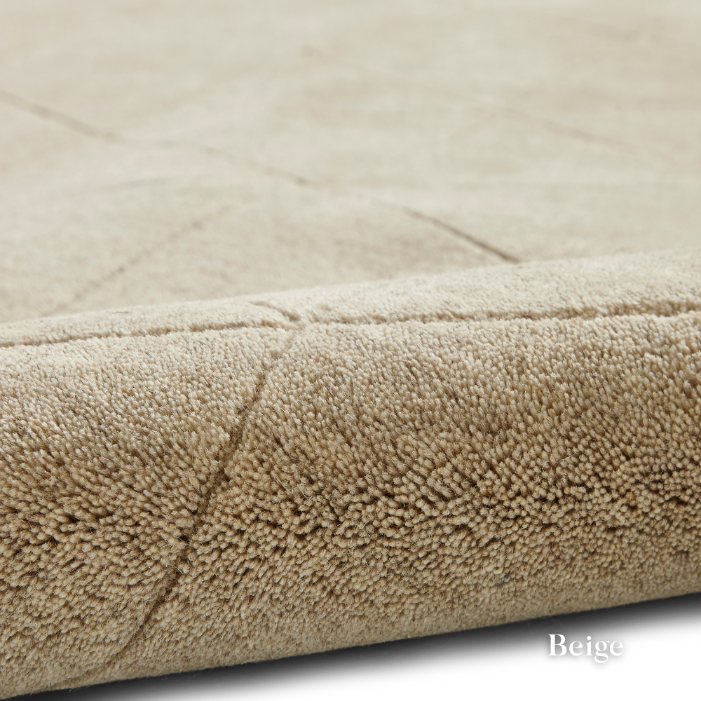 The Kasbah Modern Hand Tufted Wool Rugs offers luxurious wool, a thick pile and bold colours, making them a stylish and durable choice for modern interiors.