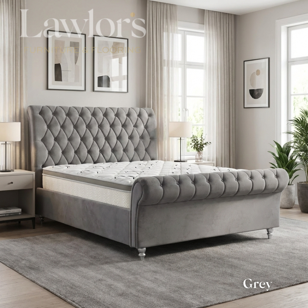 Grey upholstered bedframe and mattress in a well-lit bedroom bed pack