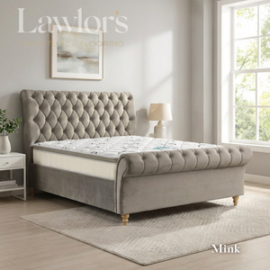 Mink upholstered bedframe and mattress in a well-lit bedroom bed pack