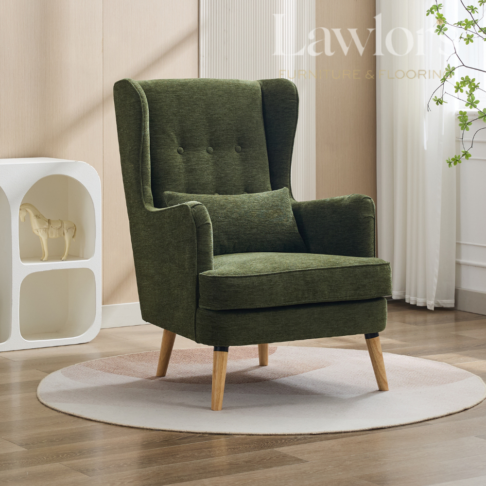 Green armchair in a room