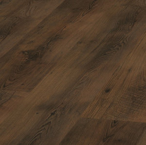 The Leonardo Oak Laminate Flooring - 12mm offers AC5 durability, natural wood texture, and a 30-year warranty.