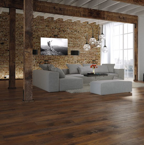 The Leonardo Oak Laminate Flooring - 12mm offers AC5 durability, natural wood texture, and a 30-year warranty.