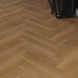 Lion Bro SPC Max Flooring 7mm offers a thick SPC core ensuring enduring beauty and stability, herringbone design and is 100% waterproof