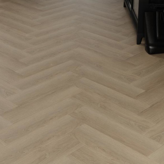 Lion No Cap SPC Max Flooring 7mm offers a herringbone design, 100% waterproof and its 7mm thick SPC core guarantees enduring beauty and stability.