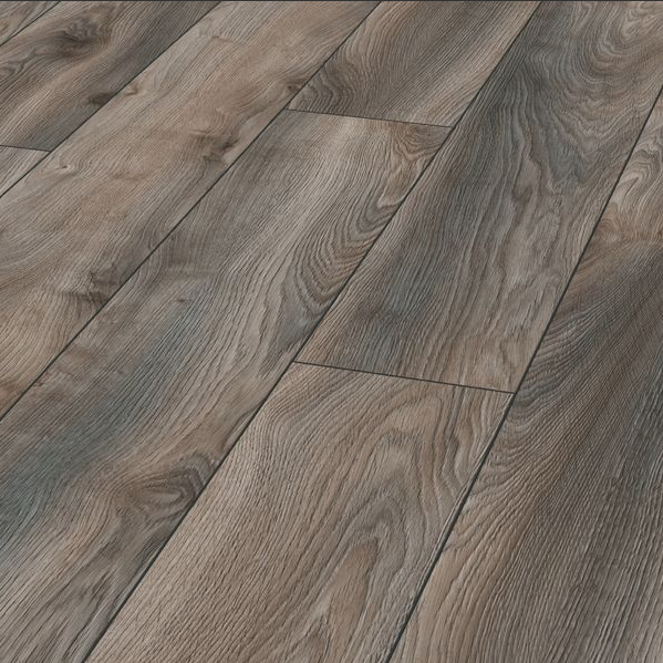 The Macro Oak Grey Laminate Flooring 12mm features AC5 durability, 5G click system, long planks and a modern oak finish.