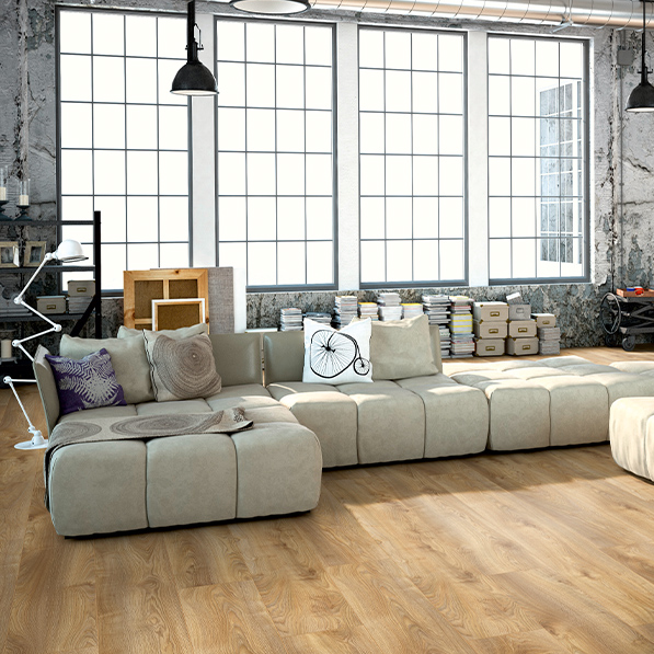The Macro Oak Nature Laminate Flooring 12mm features AC5-rating, natural oak finish on long planks and compatible with water-based underfloor heating.