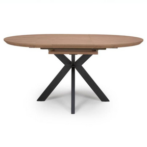 The Malin Extending Round Table 1200-1600mm in Light Walnut features heat, stain, and scratch resistance