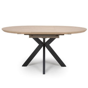The Malin Extendable Round Dining Table in Oak offers a wood-effect top ensuring heat, stain & scratch resistance