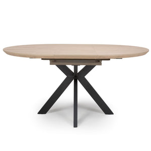 The Malin Extendable Round Dining Table in Oak offers a wood-effect top ensuring heat, stain & scratch resistance