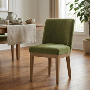 Green dining chair in dining room setting