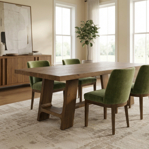 Dining room with wooden table and green chairs in a well-lit room.