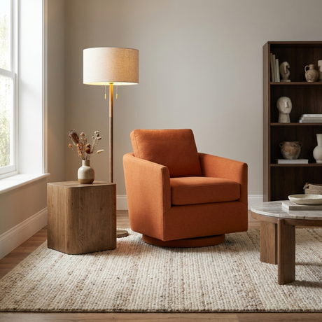 Tree table in sitting room setting next to an armchair.