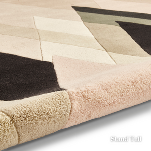 Enhance any room with the Michelle Collins Rugs offering hand tufted wool and digitally printed polyester options in two sizes for a stylish, modern touch.