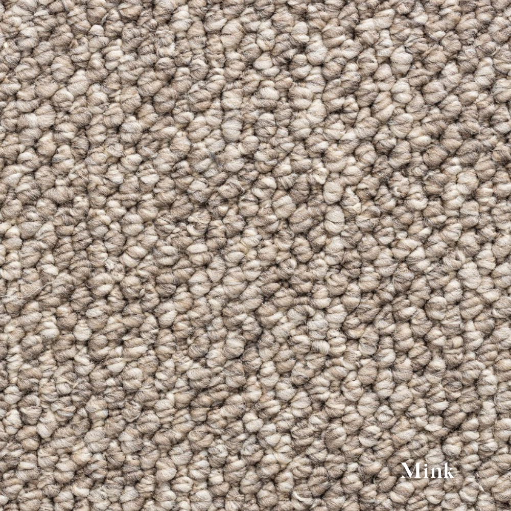 Close-up of textured beige carpet with 'Mink' label