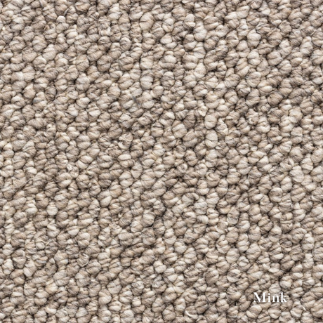 Close-up of textured beige carpet with 'Mink' label