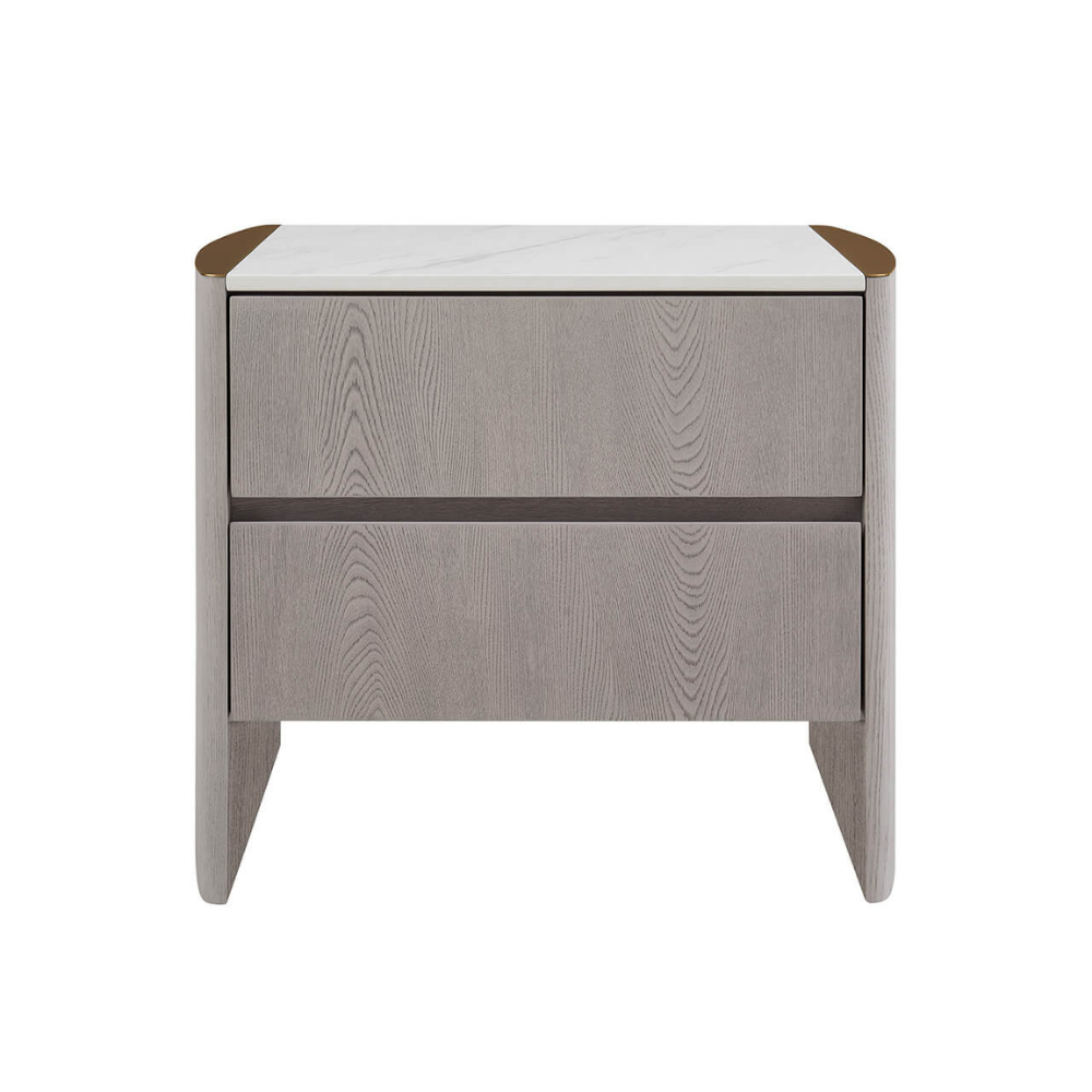 The Mondello 2 Drawer Bedside Table in Washed Oak features a luxurious sintered stone top, stainless steel accents and ample storage for a modern bedroom