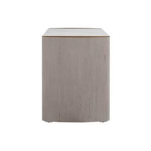 The Mondello 2 Drawer Bedside Table in Washed Oak features a luxurious sintered stone top, stainless steel accents and ample storage for a modern bedroom