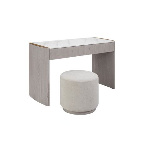 The Mondello 2 Drawer Dressing Table in Washed Oak features a luxurious sintered stone top, sleek steel accents and storage for a stylish practical bedroom