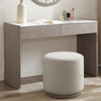 The Mondello 2 Drawer Dressing Table in Washed Oak features a luxurious sintered stone top, sleek steel accents and storage for a stylish practical bedroom