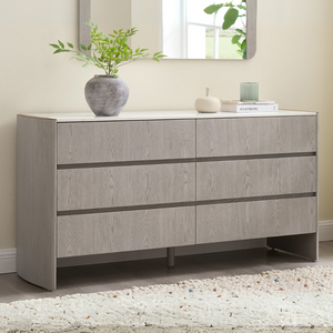 The Mondello 6 Drawer Chest in Washed Oak features a durable sintered stone top, luxurious detailing and 6 spacious drawers for style and functionality
