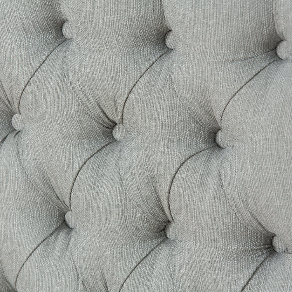 The Monika Fabric Headboard - 56" features elegant deep button Chesterfield design, custom fabric and floor standing with chrome gliders, ideal for any bed!