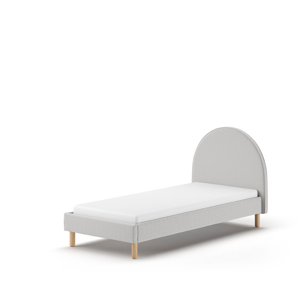 The Moon Kids Bed 90 x 200cm in Grey Boucle features a rounded headboard, soft upholstery and durable frame that is both cozy and stylish for any child