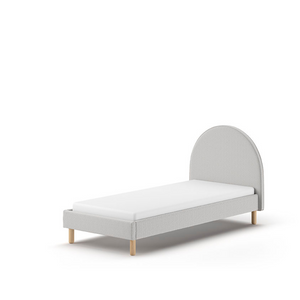 The Moon Kids Bed 90 x 200cm in Grey Boucle features a rounded headboard, soft upholstery and durable frame that is both cozy and stylish for any child