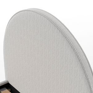 The Moon Kids Bed 90 x 200cm in Grey Boucle features a rounded headboard, soft upholstery and durable frame that is both cozy and stylish for any child