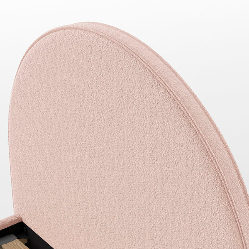 The Moon Kids Bed 90 x 200cm in Pink Boucle features a rounded headboard, soft upholstery and durable frame that is both cozy and stylish for any child