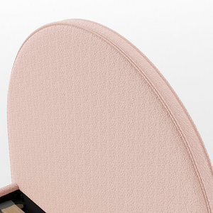 The Moon Kids Bed 90 x 200cm in Pink Boucle features a rounded headboard, soft upholstery and durable frame that is both cozy and stylish for any child